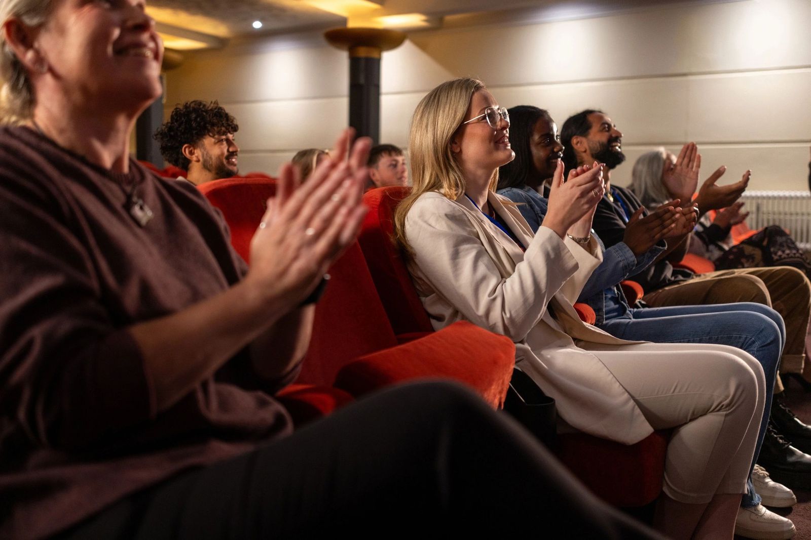 Audience applauding at an event