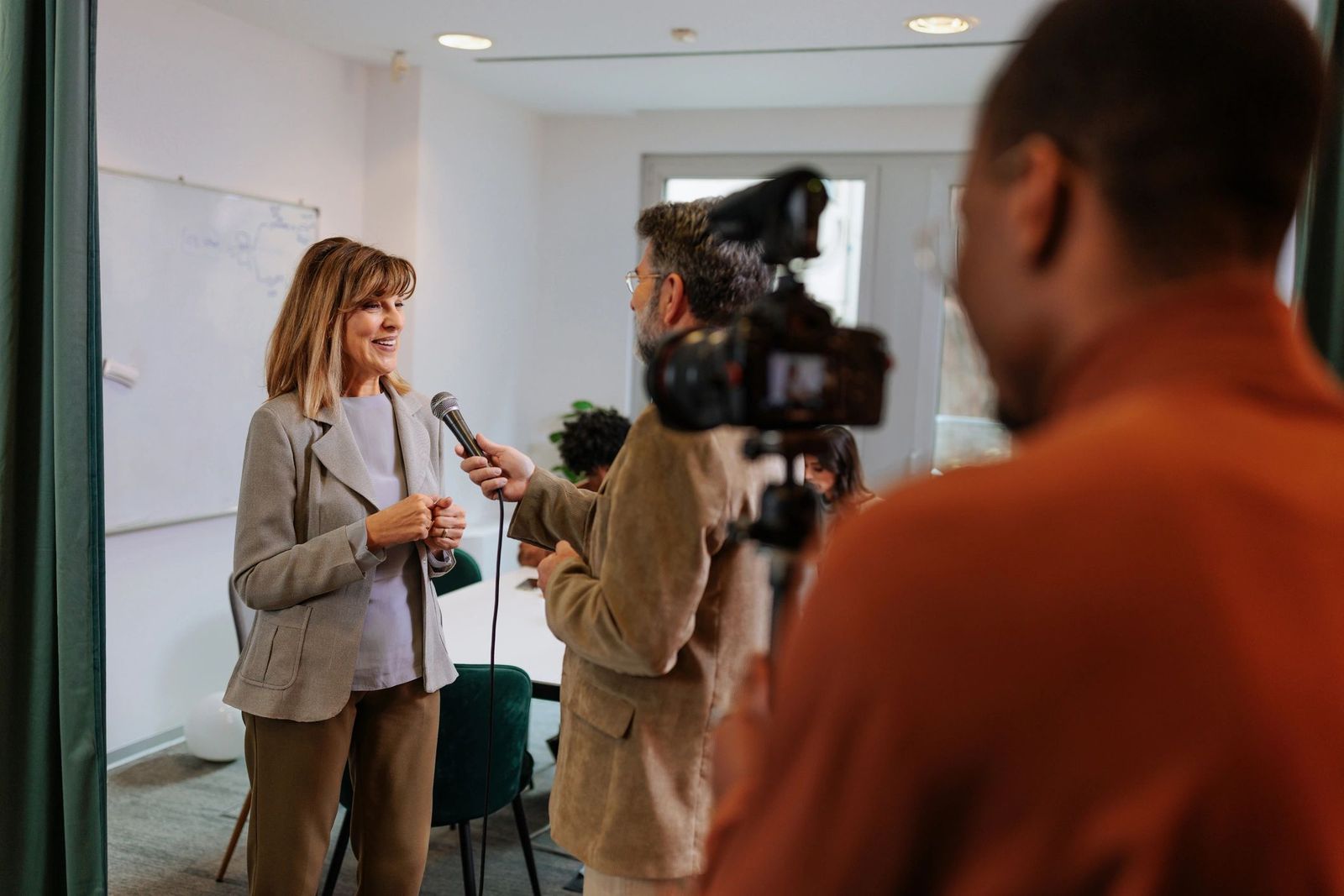 Camera crew filming an interview